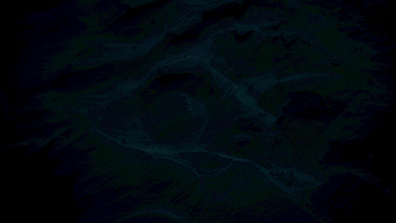 The image appears dark and unclear, making it difficult to identify any specific content or details.